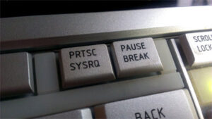 PRTSC - press to take a screen capture